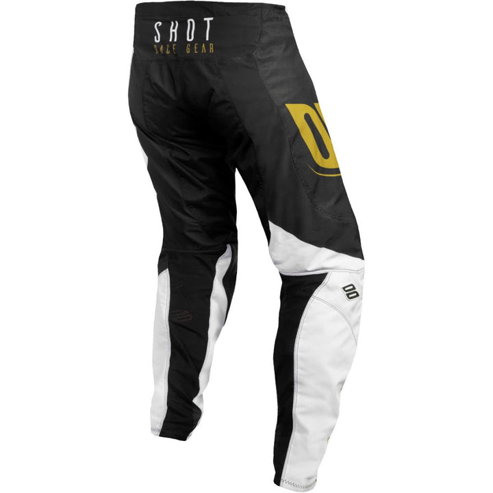 calcas-aerolite-alpha-preta-dourada-back