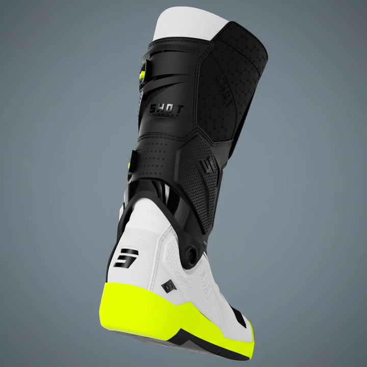Botas Shot Race 8 Black White Neon Yellow traseira - fundo garagem